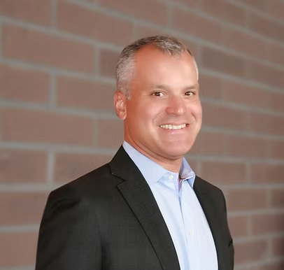 Mike Buker, President and CEO